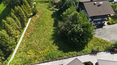 Traumhaftes Baugrundstück mit atemberaubenden Berg- & Fernblick