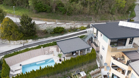 VOMP - Luxus-Maisonettenwohnung mit Swimmingpool und einer traumhaften Aussicht auf die Tiroler Bergwelt zum Verkauf