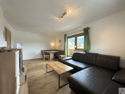 2-Zimmer-Wohnung in Uderns kaufen – Balkon, Bergblick & Tiefgarage