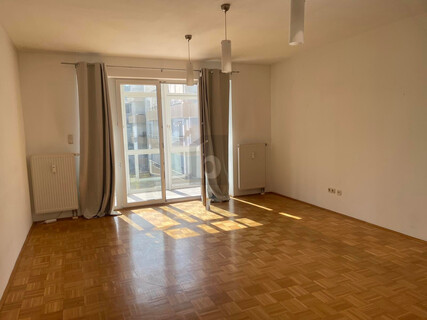 SONNIGE WOHNUNG MIT LOGGIA UND TIEFGARAGENPLATZ INKLUSIVE