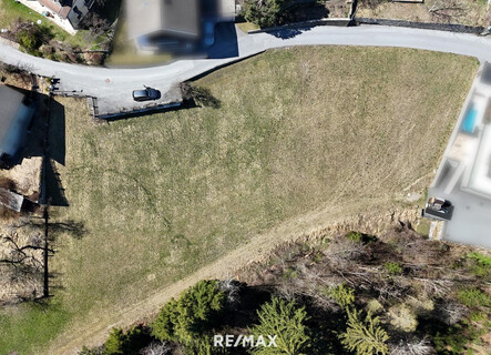 Sonniges Baugrundstück mit zusätzlicher Grünfläche am Waldrand – Aussichtslage in Arzl!