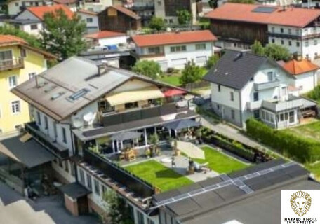 Wohn- und Betriebsgebäude in Natters