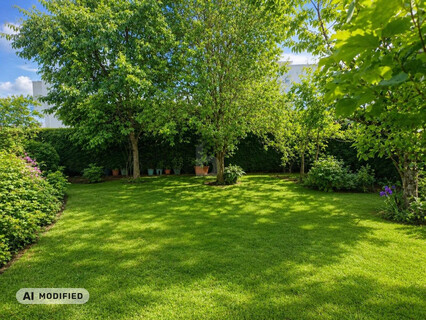GROSSZÜGIGE GARTENWOHNUNG MIT CARPORT