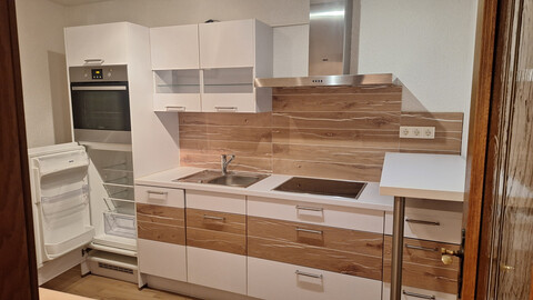 IBK-Land: Gemütliche, sonnige 2 Zimmer Whg. mit Westbalkon, großen Gartenanteil und 2 AAP!