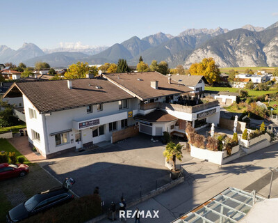 Liegenschaft mit Wohnungen- und Gewerbeeinheiten