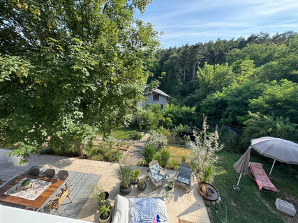 TRAUMHAFTES EINFAMILIENHAUS IM GRÜNEN MIT BLICK AUF DIE SKYLINE VON WIEN