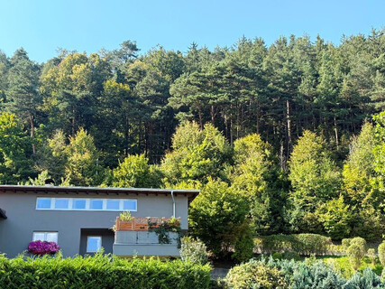 Natters: Wohnung im Stil eines Einfamilienhauses