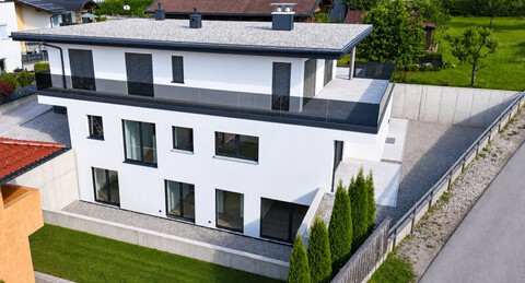 Exklusive Haushälfte in Bad Häring – Erstbezug mit Garten und großzügigen Sonnenterrassen